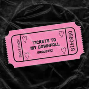 黑色布料上的「Tickets to My Downfall (Acoustic)」粉紅色演唱會門票。