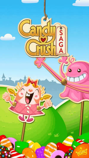 Candy Crush Saga 遊戲角色在色彩繽紛的糖果景觀中。