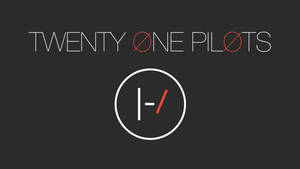 Twenty One Pilots 樂隊標誌，帶有風格化文字和圓形符號。