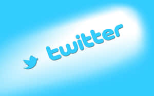 Twitter 標誌，包含藍色鳥和文字，背景為漸變藍色。 — 2880x1800 壁紙