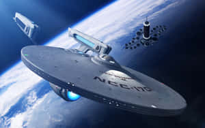 USS Enterprise NCC-1701 在地球軌道上，附近有兩艘較小的飛船。