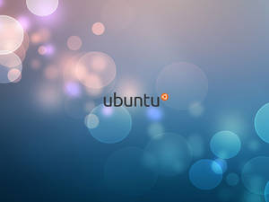 Ubuntu 標誌在藍色漸變背景上帶有發光的散景燈光。