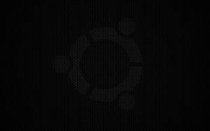 由發光六邊形在深色網格背景上組成的 Ubuntu 標誌。