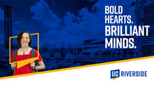 在加州大學河濱分校，穿著紅色連衣裙的學生微笑著，標語為「Bold Hearts Brilliant Minds」。