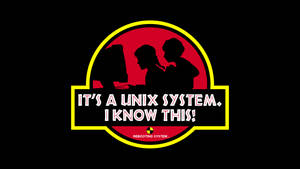 兩個人在電腦前，位於侏羅紀公園風格的標誌內，文字為「It's a Unix System. I Know This!」