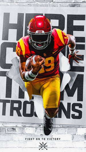 USC Trojans美式足球員衝破磚牆上嘅海報。 — 圖像 GIF 壁紙