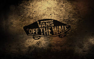 Vans Off The Wall標誌在帶有紋理的混凝土牆上，帶有聚光燈效果。