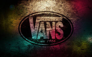 Vans 品牌標誌搭配彩虹漸變和 grunge 紋理背景。 — Vans GIF 壁紙