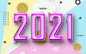 粉紅色金屬2021氣球在色彩繽紛的幾何背景上，帶有金色閃粉。