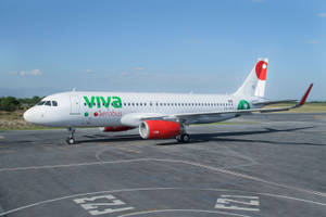 Viva Aerobus飛機在藍天下停在機場停機坪 — Air Jordan GIF 壁紙