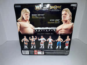 WWE摔角動作人偶收藏盒，正面有Bobby Eaton和Stan Lane。 — 4:3 壁紙
