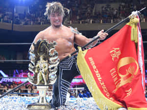 摔角手在勝利後於擂台上手持獎盃和橫幅 — 冠軍 壁紙