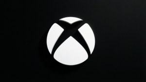 黑色背景上的白色Xbox標誌，帶有微妙陰影效果