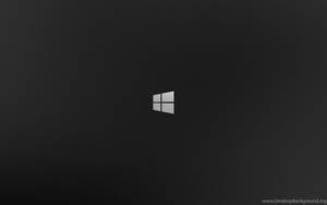Windows標誌居中於深色紋理背景上