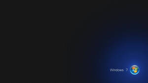 Windows 7 標誌在深色紋理背景上發出藍色光芒