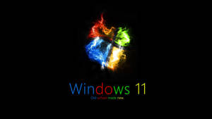 Windows 11 標誌在黑色背景上呈現火熱色彩，附有標語。