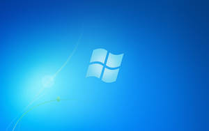 Windows 標誌帶有光線條紋和綠色嫩芽，背景為藍色漸變。