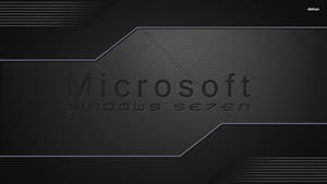 深色紋理背景上的Microsoft Windows Seven標誌。 — 黑色桌面 壁紙