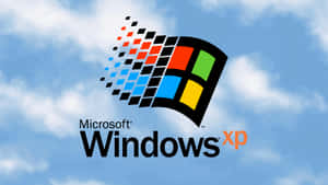 Windows XP 標誌漂浮在藍天白雲中。
