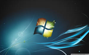 Windows 標誌被流動的藍色能量流包圍，在宇宙環境中。 — 視窗 壁紙