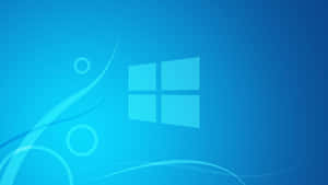 Windows 標誌在漸變藍色背景上，帶有抽象漩渦 — 界王拳 壁紙