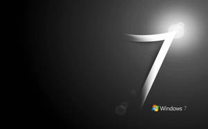 Windows 7 標誌，在深色漸變背景上帶有發光的數字七