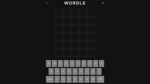 Wordle 遊戲畫面，包含空白網格和 QWERTY 鍵盤