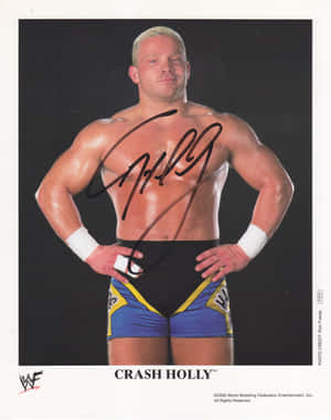 摔角手 Crash Holly 身穿藍黃色短褲和白色護腕，雙手叉腰擺姿勢。 — 4:5 壁紙