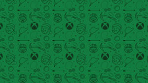 帶有重複Xbox標誌和遊戲圖標的綠色壁紙。