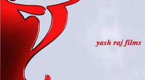 紅色抽象標誌，帶有 'yash raj films' 文字，置於灰色背景上。