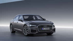 在攝影棚中帶有漸變背景的灰色奧迪A6房車。 — Audi R8 GIF 壁紙