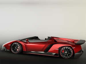 帶有黑色飾件和空氣動力學設計的紅色林寶堅尼 Veneno Roadster。 — 蘭博基尼 壁紙