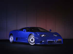 藍色Bugatti EB110跑車在攝影棚中，帶有戲劇性燈光。 — 布加迪 壁紙