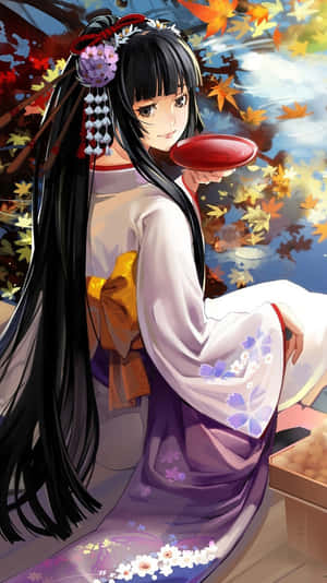 穿著和服的動漫女孩在秋葉下喝茶