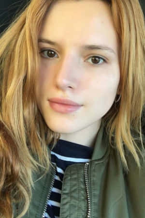 金髮年輕女性著綠色外套同間條恤衫。 — 靚女gif 壁紙