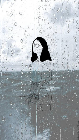戴眼鏡的女子透過濺滿雨水的窗戶望向灰色的海洋。 — 雨 壁紙