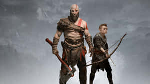 《God of War》主角克雷多斯與其子阿特柔斯身處雪覆蓋的山區環境。 — 全軍破敵：阿提拉 壁紙