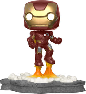 鐵甲奇俠Funko Pop人偶，靴子噴出火焰，站在岩石底座上。 — Galaxy Z Flip 8 壁紙