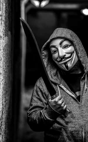 戴蓋伊·福克斯面具的人在小巷中持刀 — 鬼滅之刃面具 壁紙