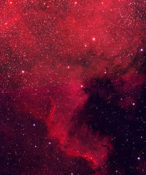 深空中充滿星星的鮮紅色星雲 — Apple Watch Ultra 壁紙