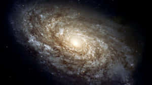 深空中帶有明亮核心和旋轉旋臂的螺旋星系。 — 銀河系 壁紙