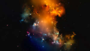 色彩繽紛的星雲，在深空中遙遠的星星之間發出橙色和藍色的光芒。 — 星雲 壁紙