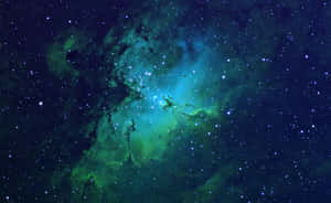 在深空中閃爍著星光的充滿活力的綠色和藍色星雲。 — 淺綠色美學動態圖 壁紙