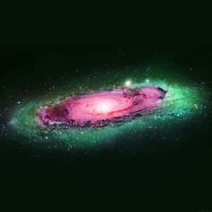 一個在深空中被星星包圍的發光粉紅色和綠色螺旋星系。 — 淺綠色美學動態圖 壁紙