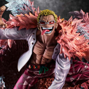 一個動漫人偶，描繪一個金髮、戴紅色太陽眼鏡的男人伸出舌頭。 — Dorohedoro 壁紙