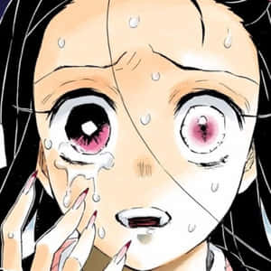 動漫女孩哭泣，睜大驚恐的眼睛，臉上掛著淚水。 — 鬼滅之刃 壁紙