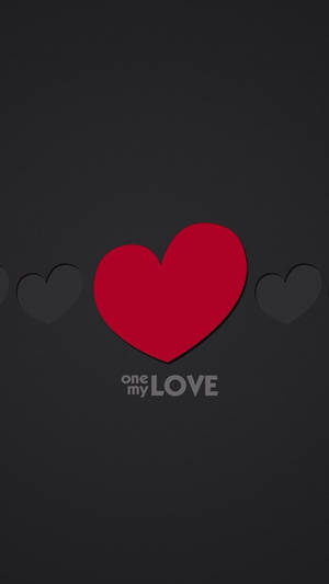 一個紅色心形，帶有模糊的灰色心形和文字 one my LOVE，位於深灰色背景上。 — 心形美學 壁紙