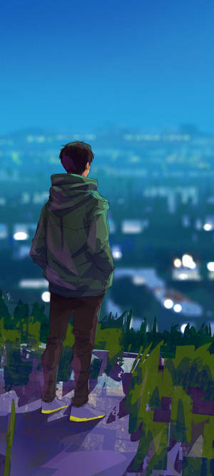 一個穿著綠色連帽衫的人從山頂俯瞰夜晚閃爍的城市。 — OnePlus 壁紙