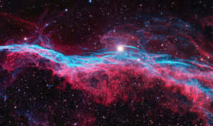 深空中帶有發光恆星的鮮豔紅色和藍色宇宙星雲。 — 煙火 壁紙