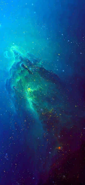 充滿活力的宇宙星雲，帶有旋轉的青綠色和紫色雲層以及散落的星星。 — Redmi Note 14 Pro 壁紙